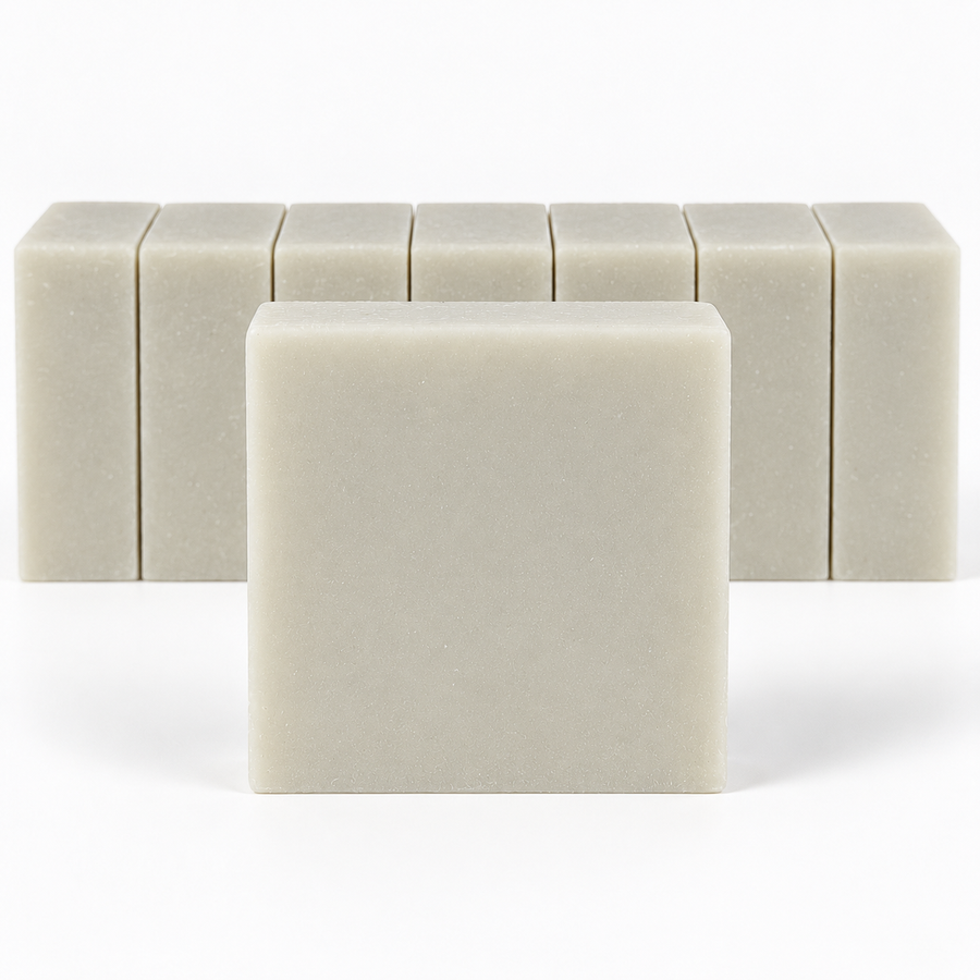 Bamboo Mud soap with a centered front bar and a clearly focused row of neatly aligned bars on a white background.
