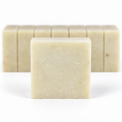 Lavender Greek Yogurt, with a sharp foreground soap bar and a softly blurred row of bars on a white background.