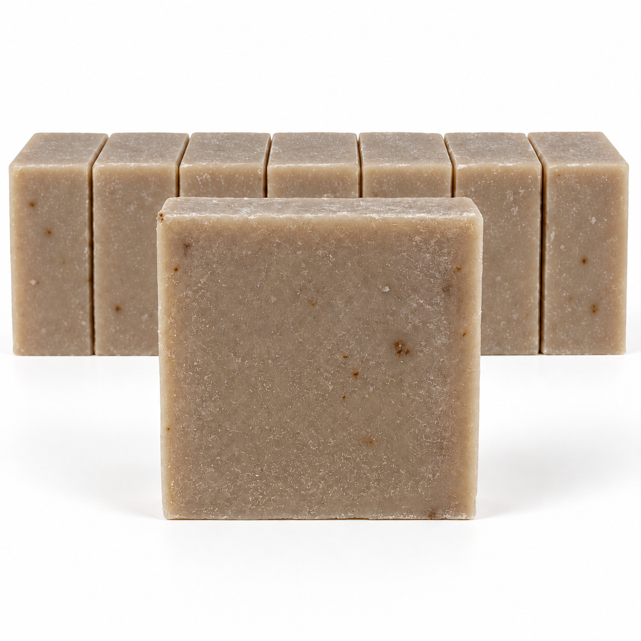 Oatmeal Goat's Milk Soap, neatly aligned soap bars in sharp detail on a white background.