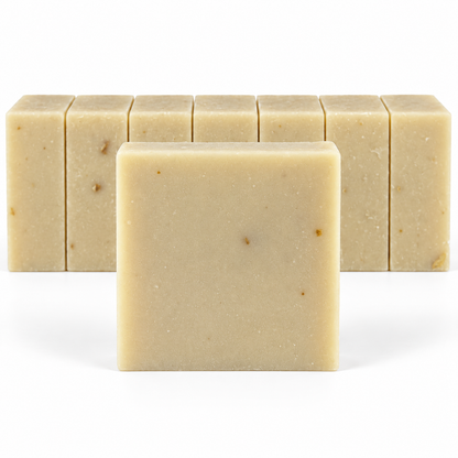 Patchouli Sandalwood Goats Milk, neatly aligned soap bars in sharp detail on a white background.