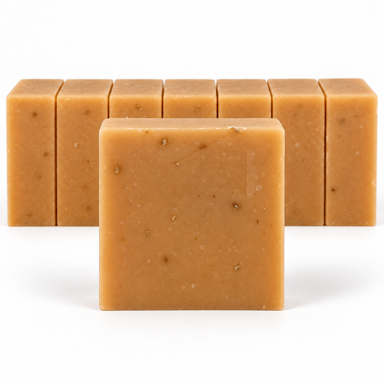 Turmeric Organic Honey & Orange, neatly aligned soap bars in sharp detail on a white background.