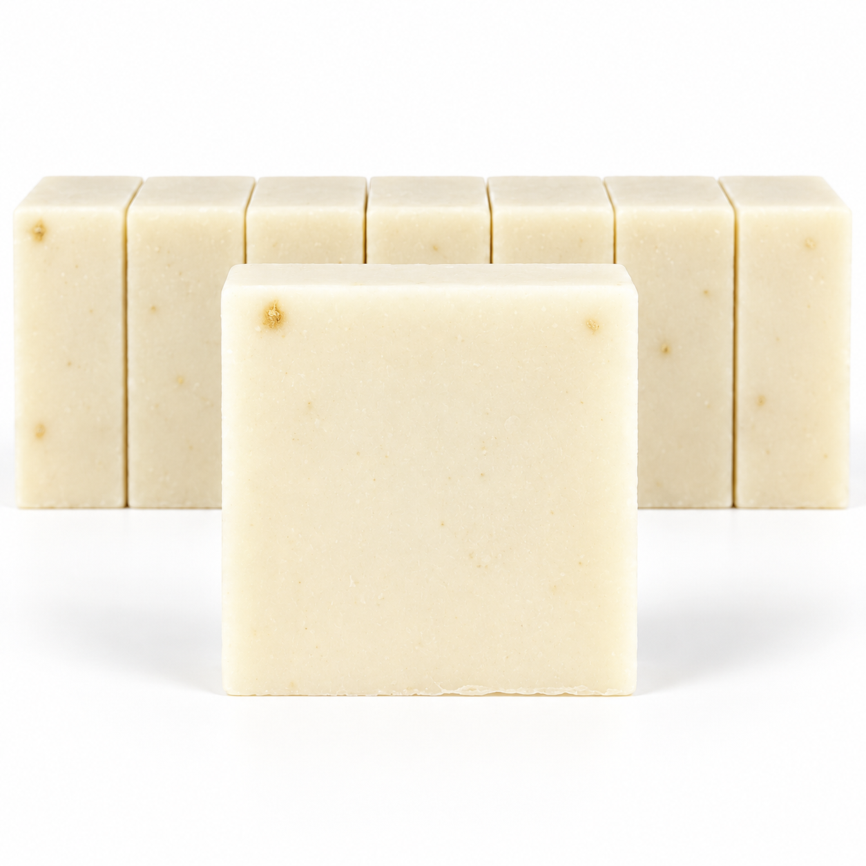 Unscented Goats Milk, neatly aligned soap bars in sharp detail on a white background.